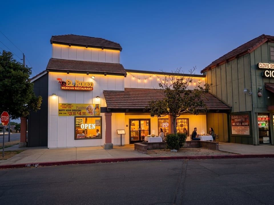 El Rodeo exterior at dusk with warm lights